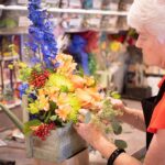 Support for floral artist at full bloom